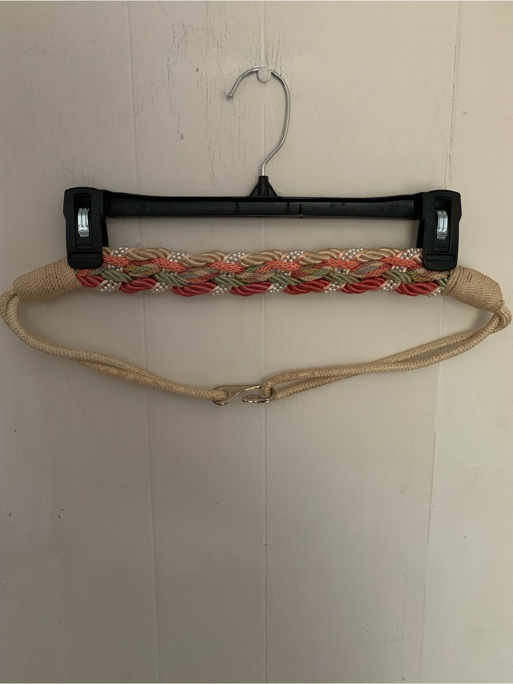 Braided beaded rope belt in coral, seafoam, and sand with silver tone clasp